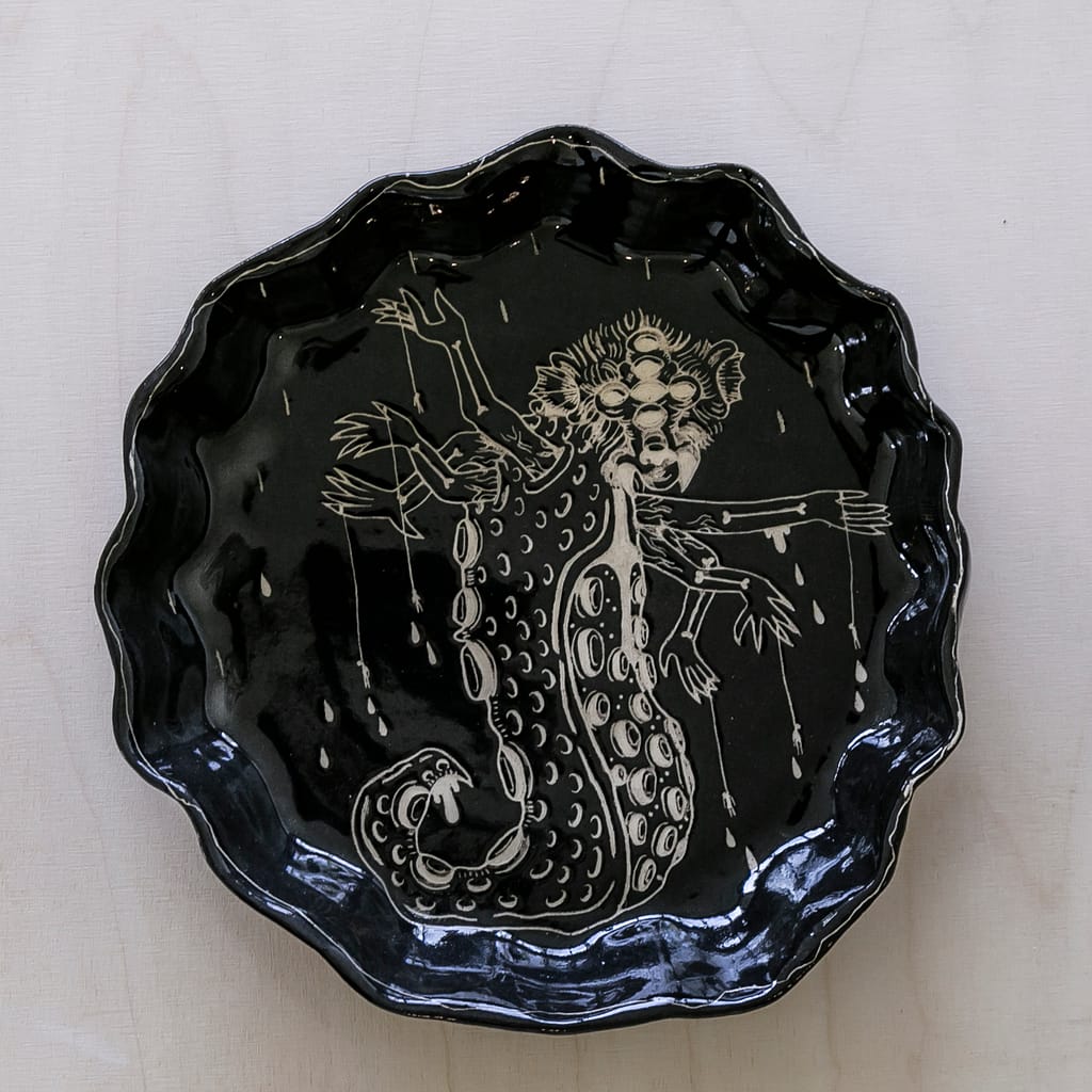 Ceramic plate with engraving.