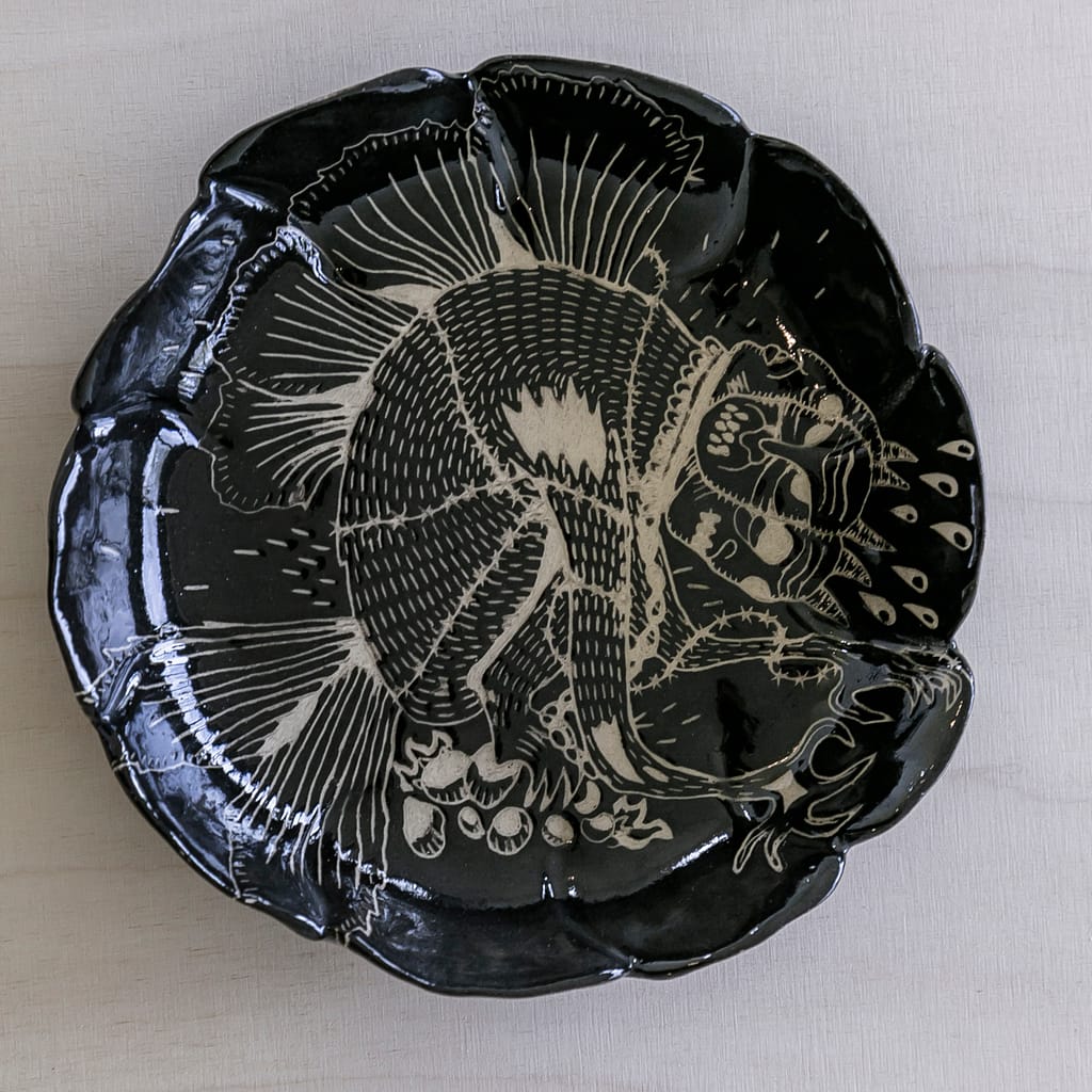 Ceramic plate with engraving.