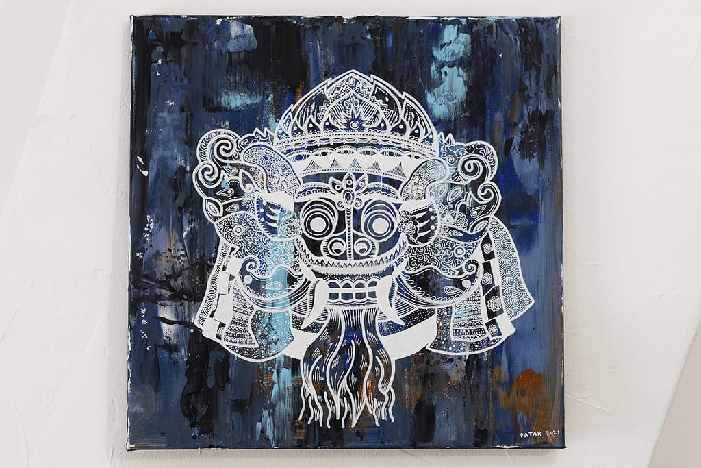 Painting representing the Balinean God "Barong", on a blue background.