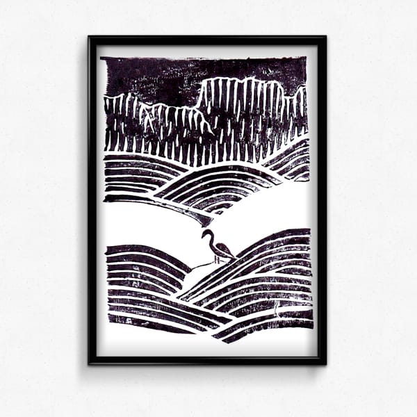 Lino cut print of a sea with a bird between the waves.
